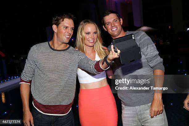 Bob Bryan, Caroline Wozniacki, and Mike Bryan attend the Taste Of Tennis Miami Presented By Citi at W South Beach on March 23, 2015 in Miami Beach,...