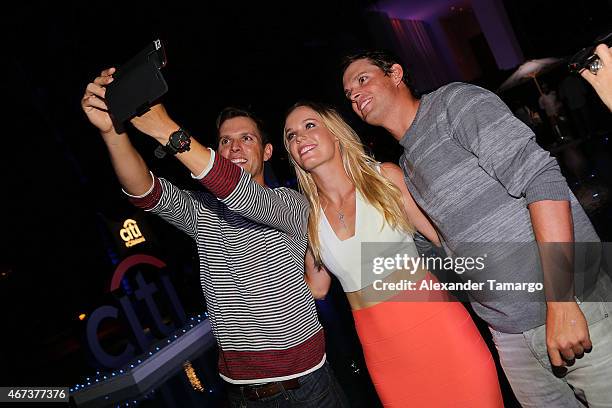 Bob Bryan, Caroline Wozniacki, and Mike Bryan attend the Taste Of Tennis Miami Presented By Citi at W South Beach on March 23, 2015 in Miami Beach,...