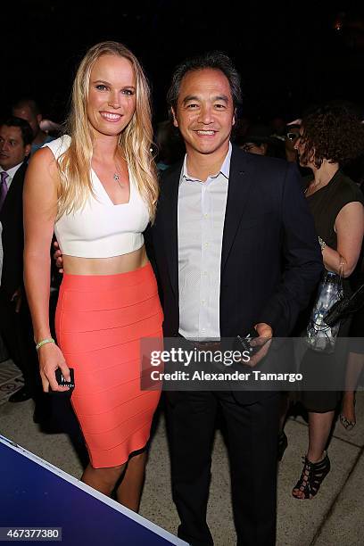 Caroline Wozniacki and Rick Ueno attend the Taste Of Tennis Miami Presented By Citi at W South Beach on March 23, 2015 in Miami Beach, Florida.