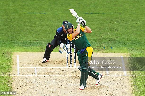 De Villiers of South Africa pulls the ball away for six runs during the 2015 Cricket World Cup Semi Final match between New Zealand and South Africa...