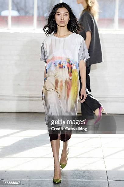 Model walks the runway at the Duckie Brown Autumn Winter 2014 fashion show during New York Fashion Week on February 6, 2014 in New York, United...