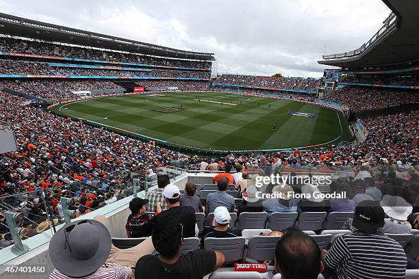 Fans watch the Cricket World Cup semi final between South Africa and New Zealand at Eden Park on March 24, 2015 in Auckland, New Zealand.