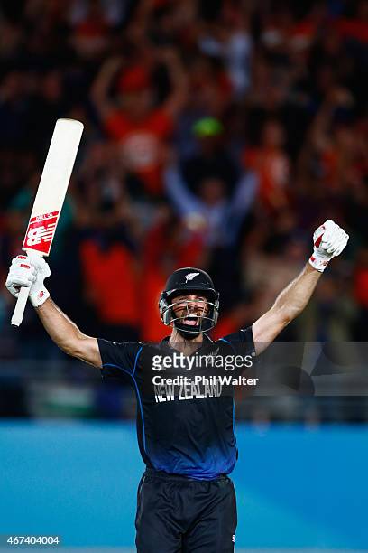 Grant Elliott of New Zealand celebrates hitting the winning runs during the 2015 Cricket World Cup Semi Final match between New Zealand and South...