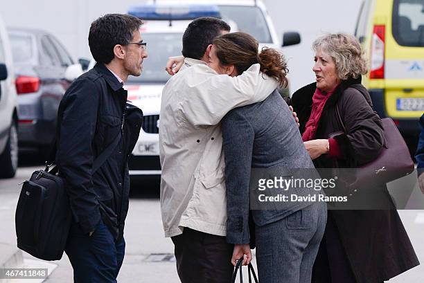 Relatives of passengers of the Germanwings plane crashed in French Alps arrive at the Terminal 2 of the Barcelona El Prat airport on March 24, 2015...
