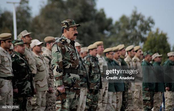 Kurdish Peshmergas attend a military ceremony at the end of the first part of the training of 375 Kurdish Peshmergas trained by U.S.-led coalition,...