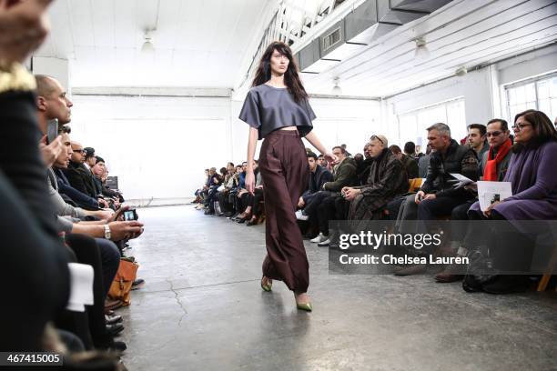 Model walks during the Duckie Brown fashion show during Mercedes-Benz Fashion Week Fall 2014 at Industria Superstudio on February 6, 2014 in New York...