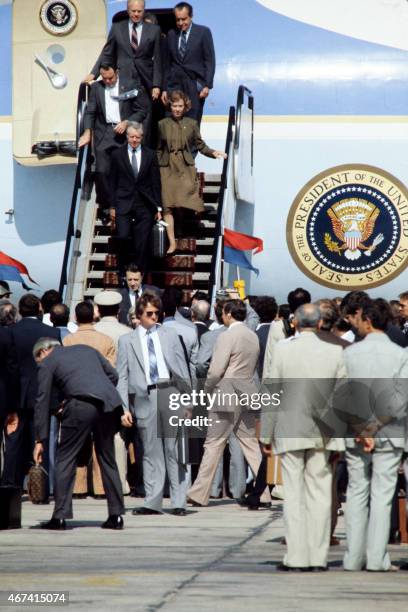 President Jimmy Carter , his wife Rosalynn Carter, former US President Richard Nixon and Gerald Ford arrive in Cairo on October 10, 1981 to attend...