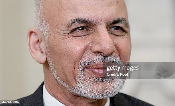 Afghan President Ghani looks on during a restricted bilateral meeting with U.S. President Barack Obama in the Oval Office of the White House March...