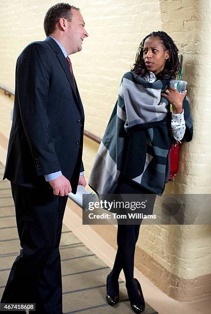 Reps. Mia Love, R-Utah, and Lee Zeldin, R-N.Y., talk after a meeting of the House Republican Conference in the Capitol, March 24, 2015.