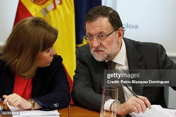 Spanish Deputy Prime Minister and Minister for the Presidency Soraya Saenz de Santamaria and Spanish Prime Minister Mariano Rajoy meet at a situation...