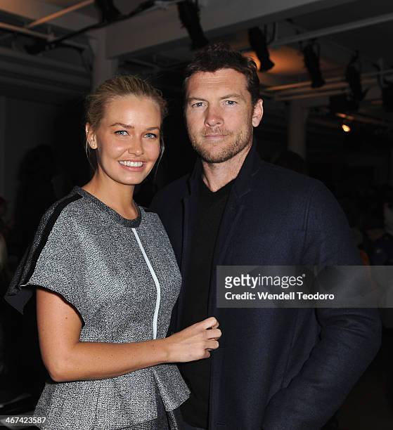 Lara Bingle and Actor Sam Worthington attends the Dion Lee show during MADE Fashion Week Fall 2014 at Milk Studios on February 6, 2014 in New York...