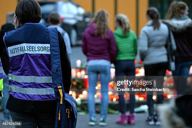 Students and well wishers gather in front of the Joseph-Koenig-Gymnasium secondary school in Haltern am See, Germany on March 24 from where some of...