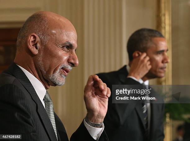 President Barack Obama and Afghan President Ashram Ghani participate in a news conference in the East Room at the White House on March 24, 2015 in...