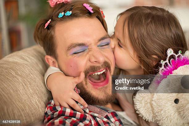 cute daughter and her father having princess time. - child princess stock pictures, royalty-free photos & images