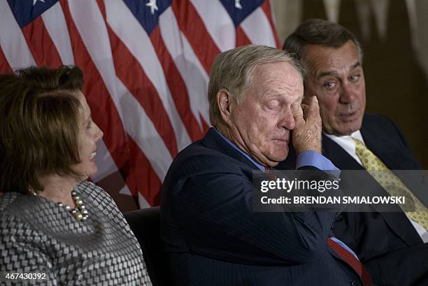 House Minority Leader Nancy Pelosi ,D-CA, and Speaker of the House John Boehner ,R-OH, watch as Jack Nicklaus wipes a tear during a Congressional...