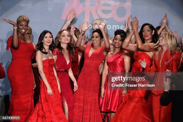 Celebrity models gather at the end of the runway at Go Red For Women - The Heart Truth Red Dress Collection 2014 Show Made Possible By Macy's And...