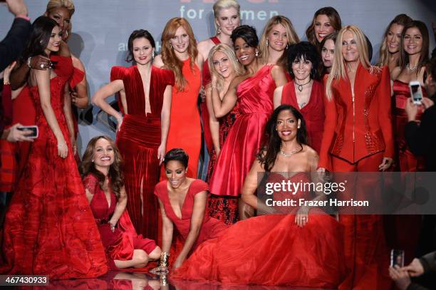 Celebrity models gather at the end of the runway at Go Red For Women - The Heart Truth Red Dress Collection 2014 Show Made Possible By Macy's And...
