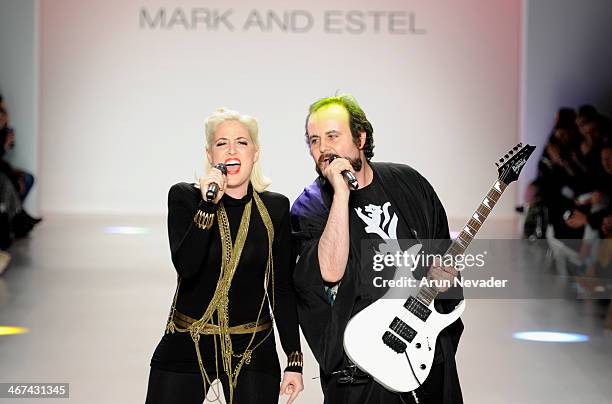Designers Estel Day and Mark Tango pose on the runway at Mark And Estel fashion show during Mercedes-Benz Fashion Week Fall 2014 at The Salon at...
