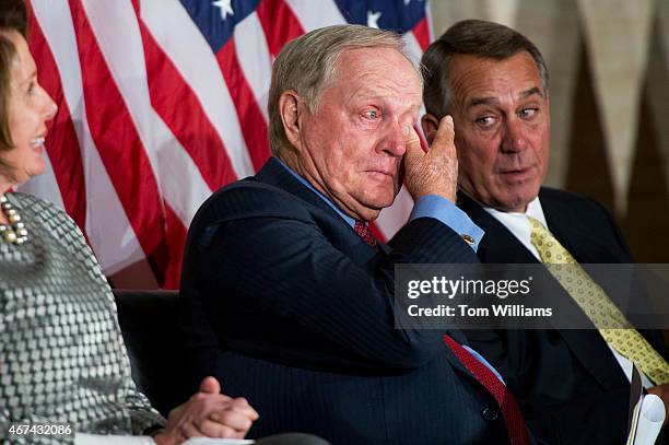 House Minority Leader Nancy Pelosi, D-Calif., golf legend Jack Nicklaus, and Speaker John Boehner, R-Ohio, attend a Congressional Gold Medal in the...