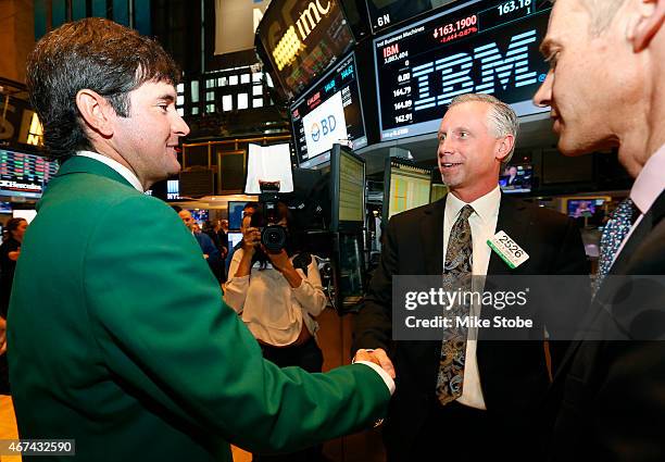 Two-time defending Masters Champion Bubba Watson greets Specialist Donald Himpele Jr. As Vice President and Co-Head of Listings at the New York Stock...