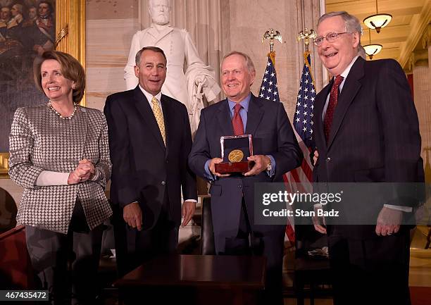Golf legend Jack Nicklaus accepts the Congressional Gold Medal during a ceremony with House Minority Leader Nancy Pelosi , Speaker of the House John...