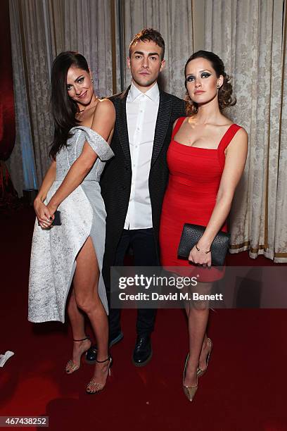 Alexandra Park, Tom Austen and Merritt Patterson attend the 'The Royals' UK premiere party at the Mandarin Oriental Hyde Park on March 24, 2015 in...