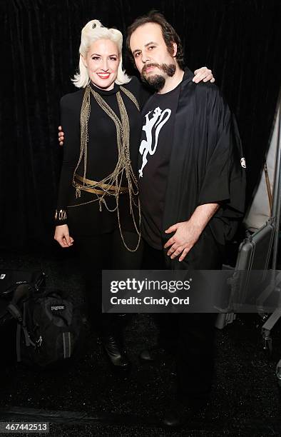Estel Day and Mark Tango prepare backstage at the Mark And Estel fashion show during Mercedes-Benz Fashion Week Fall 2014 at The Salon at Lincoln...