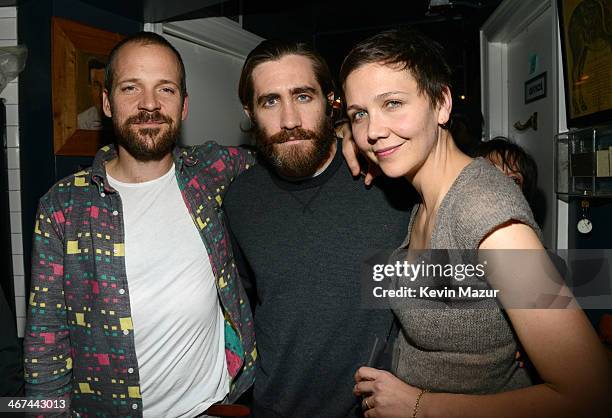 Peter Sarsgaard, Jake Gyllenhaal and Maggie Gyllenhaal attends Pussy Riot and The Voice Project party at The Spotted Pig on February 6, 2014 in New...