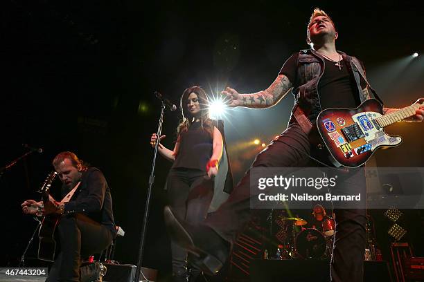 Rachel Reinert, Tom Gossin and Mike Gossin of the band Gloriana perform on stage during the 2015 NASH Bash presented by NASH FM 94.7 as part of...