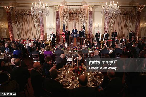 Secretary of State John Kerry speaks as Afghanistan President Ashraf Ghani and Afghanistan Chief Executie Abdullah Abdullah listen as they make...