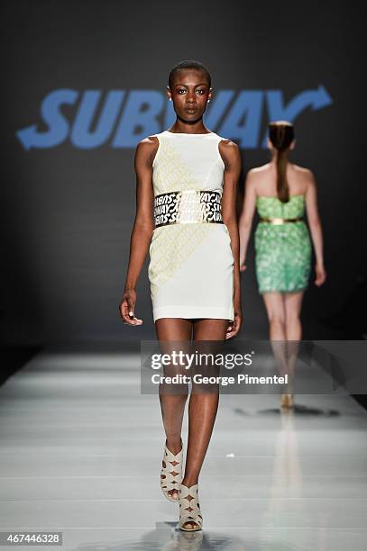 Model walks the runway wearing Vawk fall 2015 collection during World MasterCard Fashion Week Fall 2015 at David Pecaut Square on March 24, 2015 in...