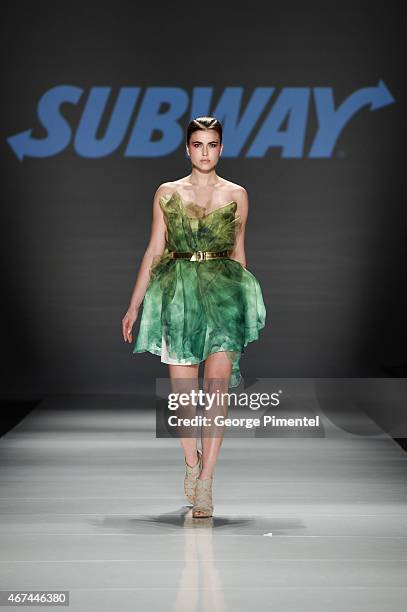 Model walks the runway wearing Vawk fall 2015 collection during World MasterCard Fashion Week Fall 2015 at David Pecaut Square on March 24, 2015 in...