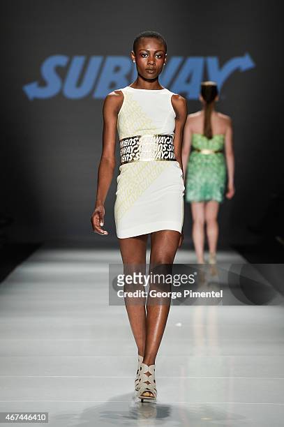 Model walks the runway wearing Vawk fall 2015 collection during World MasterCard Fashion Week Fall 2015 at David Pecaut Square on March 24, 2015 in...