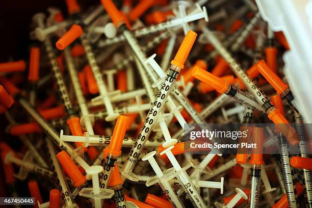 Used syringes are discarded at a needle exchange clinic where users can pick up new syringes and other clean items for those dependent on heroin on...