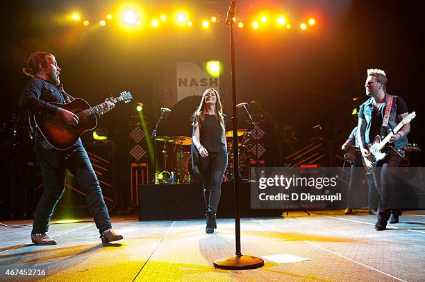 Tom Gossin, Rachel Reinert, and Mike Gossin of Gloriana perform onstage at the 2015 NASH Bash at Barclays Center on March 24, 2015 in New York City.