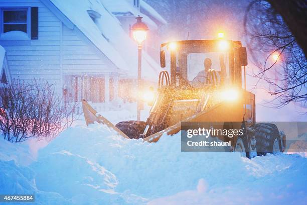 plowing a city street - snow plow stock pictures, royalty-free photos & images