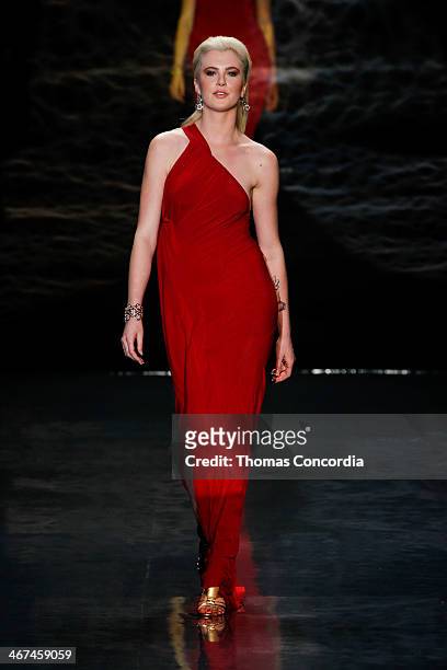 Ireland Baldwin walks the runway wearing Donna Karan at Heart Truth Red Dress Collection during Mercedes-Benz Fashion Week Fall 2014 at The Theatre...