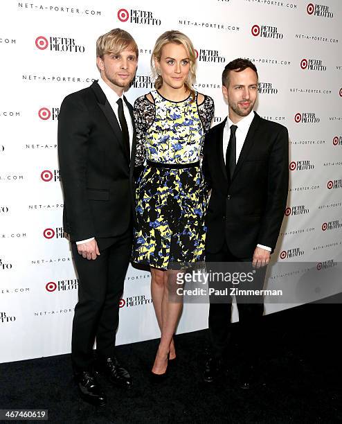 Fashion designers Christopher De Vos and Peter Pilotto pose with actress Taylor Schilling at the PETER PILOTTO for Target launch event on February 6,...