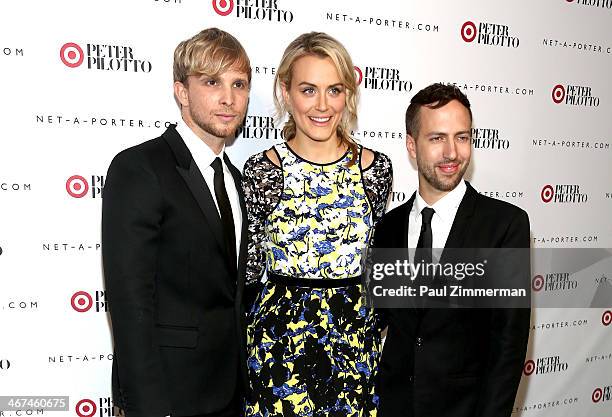 Fashion designers Christopher De Vos and Peter Pilotto pose with actress Taylor Schilling at the PETER PILOTTO for Target launch event on February 6,...