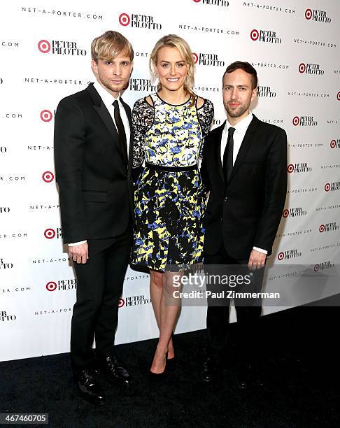Fashion designers Christopher De Vos and Peter Pilotto pose with actress Taylor Schilling at the PETER PILOTTO for Target launch event on February 6,...