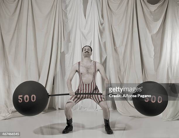 circus strongman - circus curtains stock pictures, royalty-free photos & images