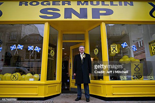 Candidate Roger Mullin, opens a general election campaign shop in the constituency of former prime minister Gordon Brown on March 24, 2015 in...