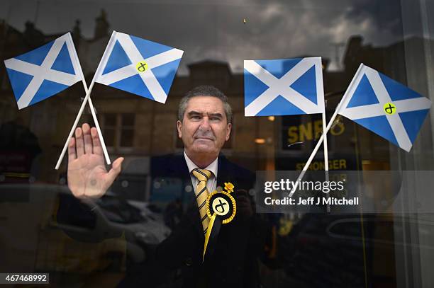 Candidate Roger Mullin, opens a general election campaign shop in the constituency of former prime minister Gordon Brown on March 24, 2015 in...