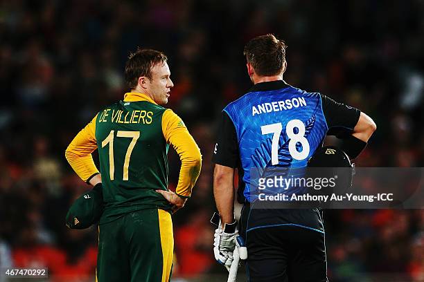 De Villiers of South Africa has a word with Corey Anderson of New Zealand during the 2015 Cricket World Cup Semi Final match between New Zealand and...
