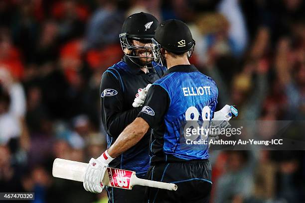 Grant Elliott and Daniel Vettori of New Zealand celebrate winning the 2015 Cricket World Cup Semi Final match between New Zealand and South Africa at...