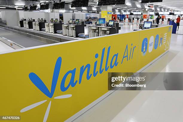 Check-in counter for Vanilla Air stands at Terminal 3 of Narita Airport in Narita, Japan, on Wednesday, March 25, 2015. The airport operator Narita...
