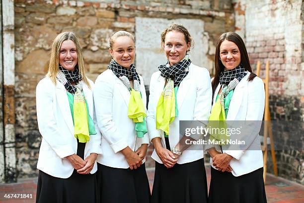 Storm Sanders, Ashleigh Barty, Samantha Stosur and Casey Dellacqua of Australia pose for a photo before the official dinner ahead of the Fed Cup Tie...