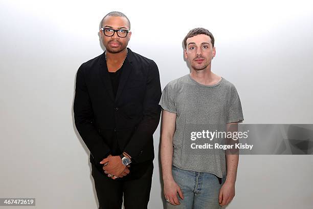 Bernard James and Dreu attend the Dreu & Bernard James presentation during Mercedes-Benz Fashion Week Fall 2014 at Drift Studios on February 6, 2014...