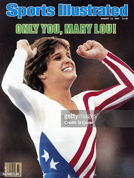 August 13, 1984 Sports Illustrated via Getty Images Cover: Gymnastics: 1984 Summer Olympics: Closeup of USA Mary Lou Retton victorious after winning...