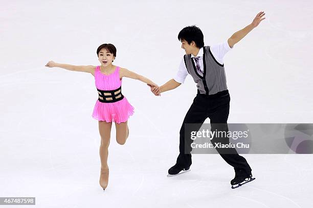 Narumi Takahashi and Ryuichi Kihara of Japan perform during the Pairs Short Program on day one of the 2015 ISU World Figure Skating Championships at...